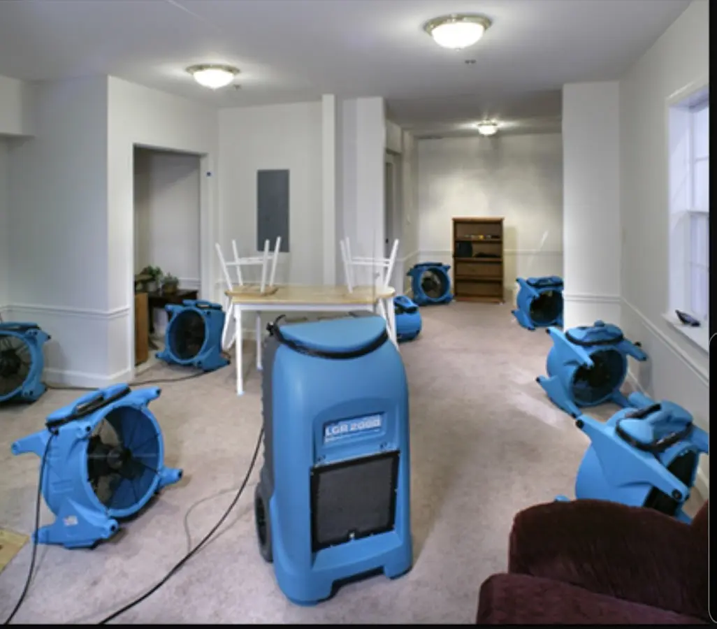 Air movers and dehumidifier setup for Water Damage Restoration in De Soto